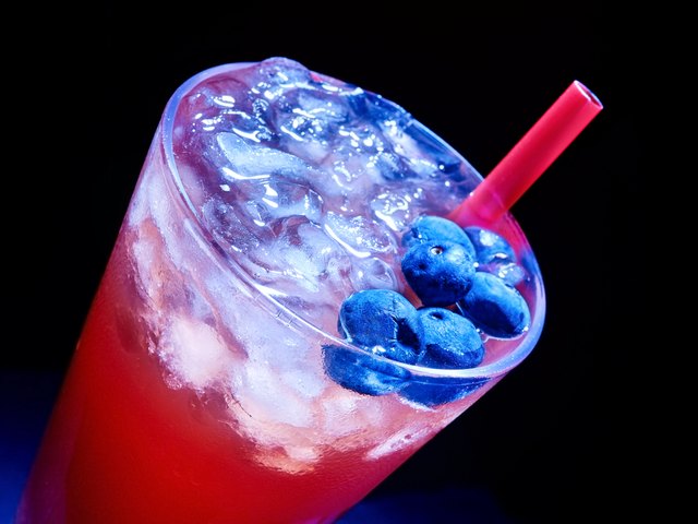 Blueberry cocktail on dark background