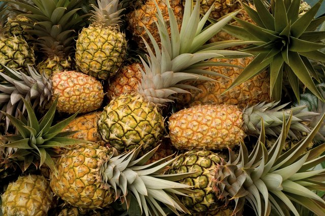 Fresh pineapples as a background