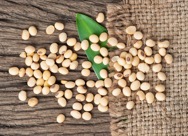 Soybeans on old wood background,