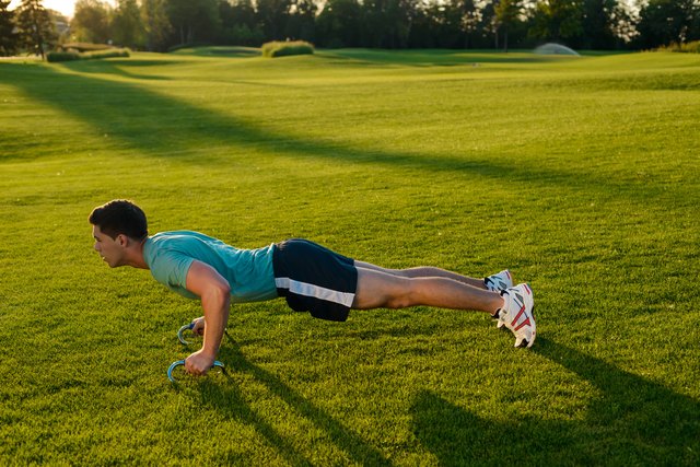 Guy engaged in sports at the park.