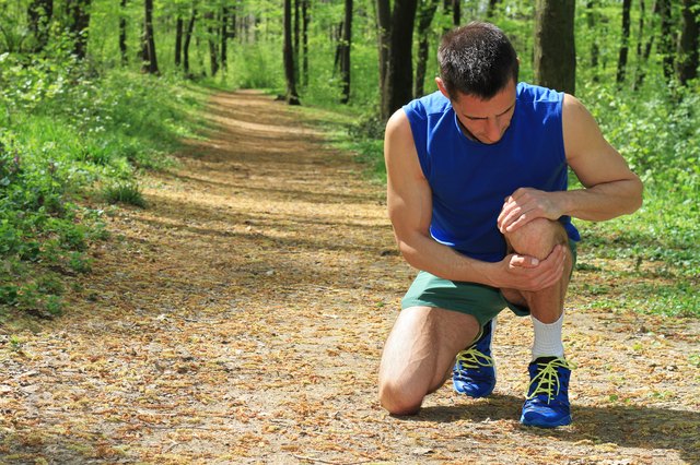 Knee injury, Man runner with knee pain