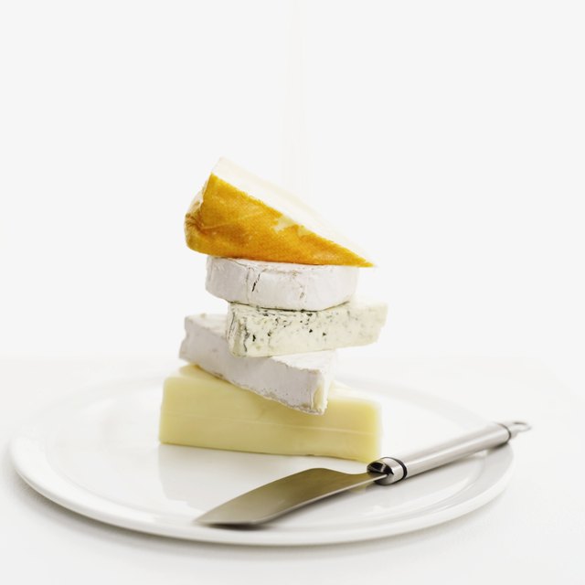close-up of assorted cheeses on a plate