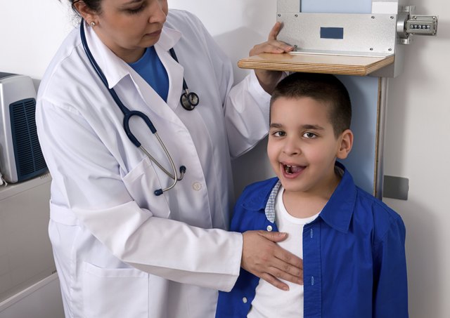 Doctor Measuring Height