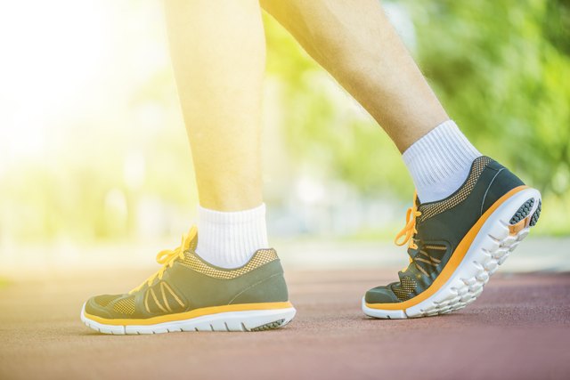 Close up shot of runner's shoes