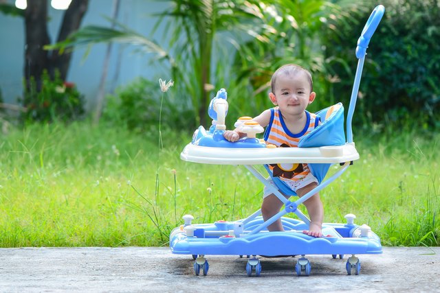 Asian baby in the baby walker