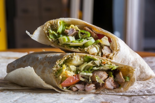 Cut indian wrap with chicken meat and garam masala