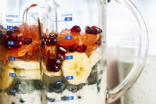 Blender with fruit and yogurt for smoothies