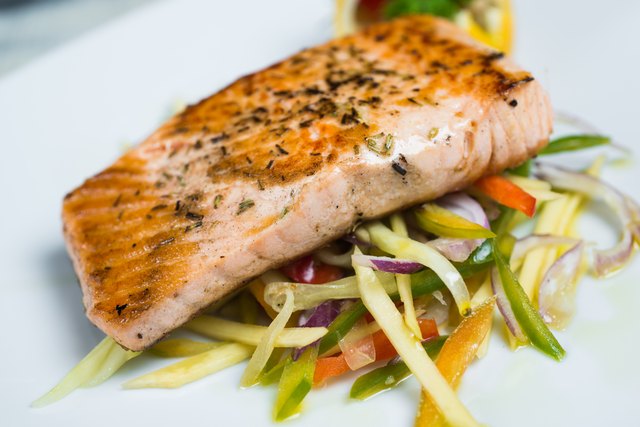 Grilled salmon steak and vegetables