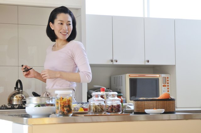 Mid Adult Woman with Apron Looking Back