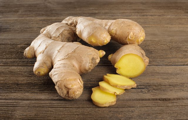 Ginger on the wooden table close up