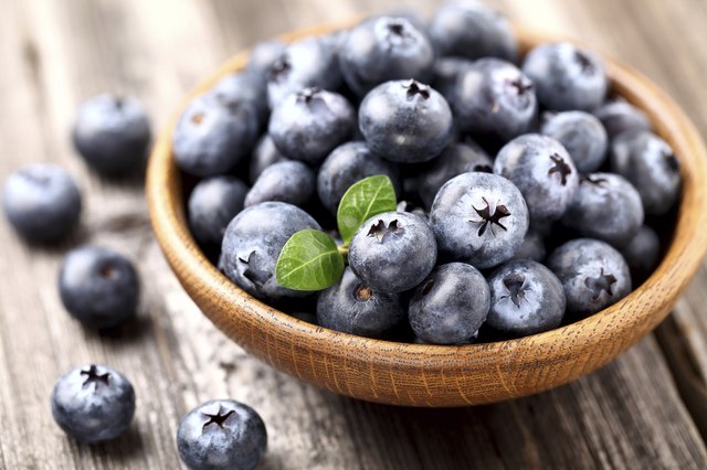 Blueberry in a wooden plate