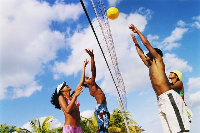 Teenagers Playing Volleyball