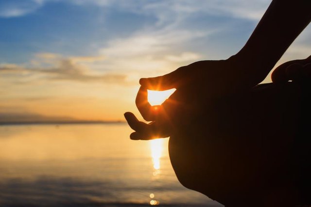 serenity and yoga practicing at sunset, meditation