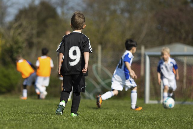 Kids practicing soccer
