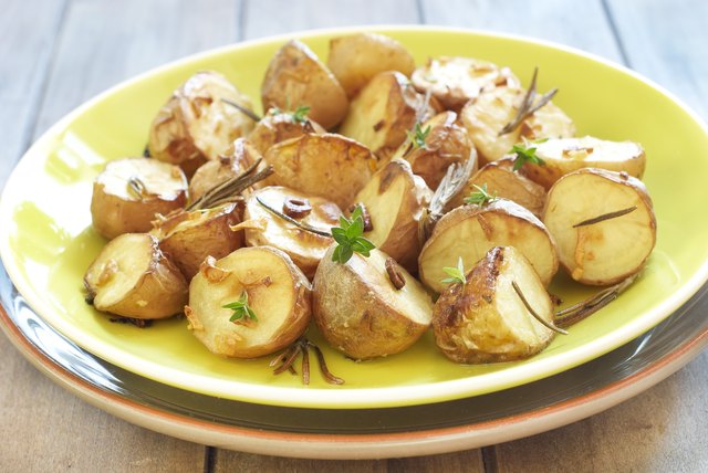 Baked potatoes with garlic and herbs