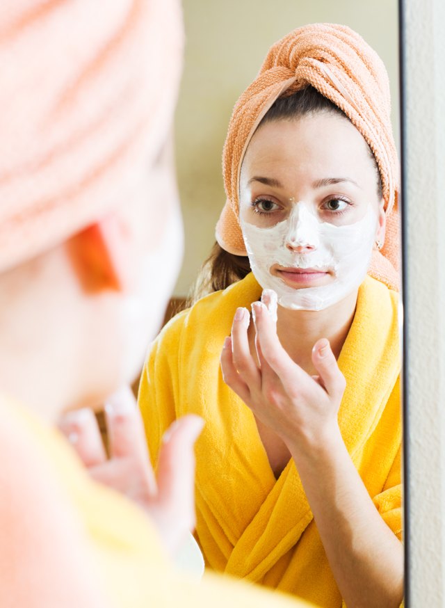 Woman taking care of face