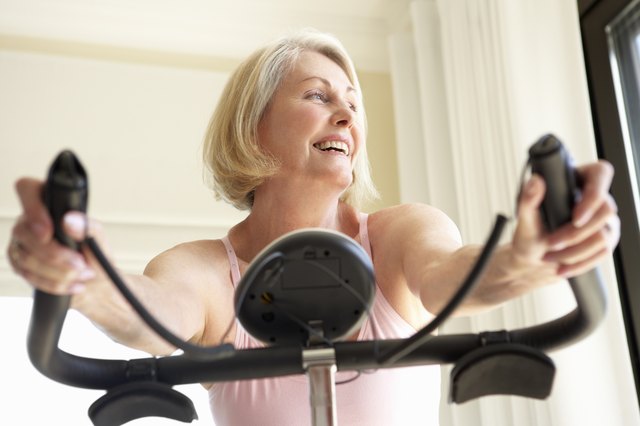 Senior Woman On Exercise Bike