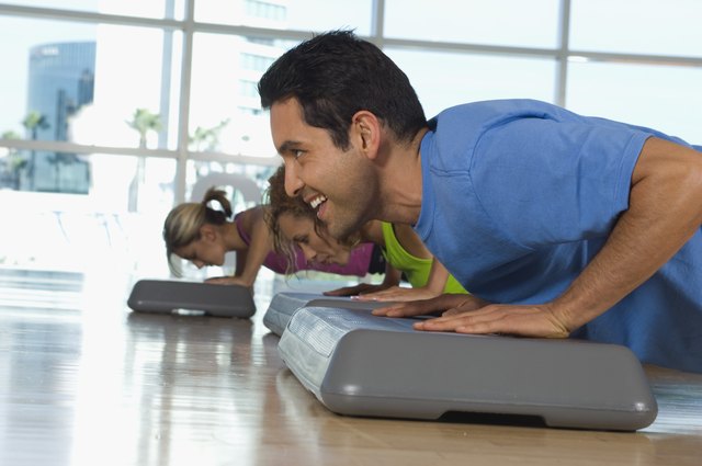 People Doing Pushups in Exercise Class