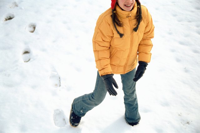 Girl walking in the snow
