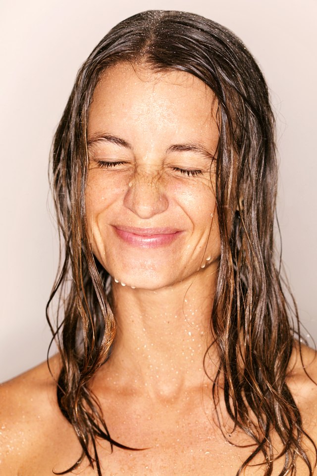 Head and shoulders shot of wet woman
