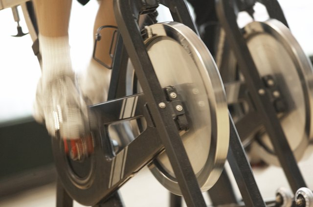Low section view of a person on an exercise bike
