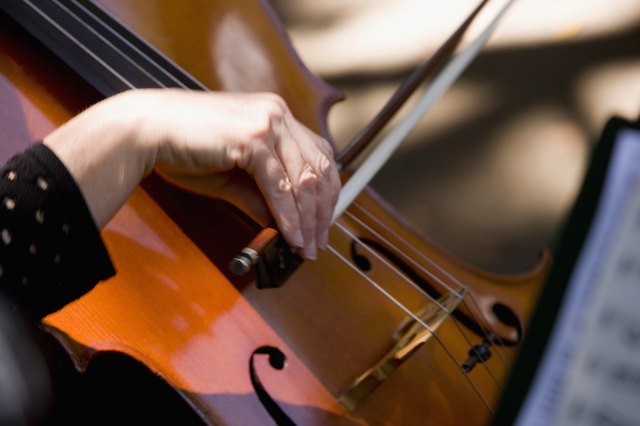 Close-up of a woman playing the cello, Balboa Park, San Diego, California, USA