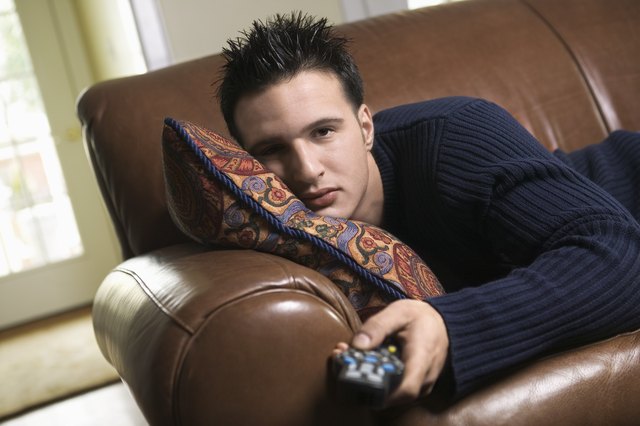 Man lounging with a remote control