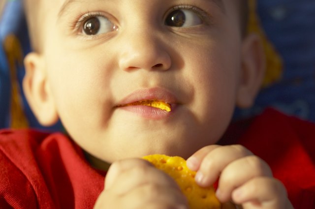 Toddler boy eating