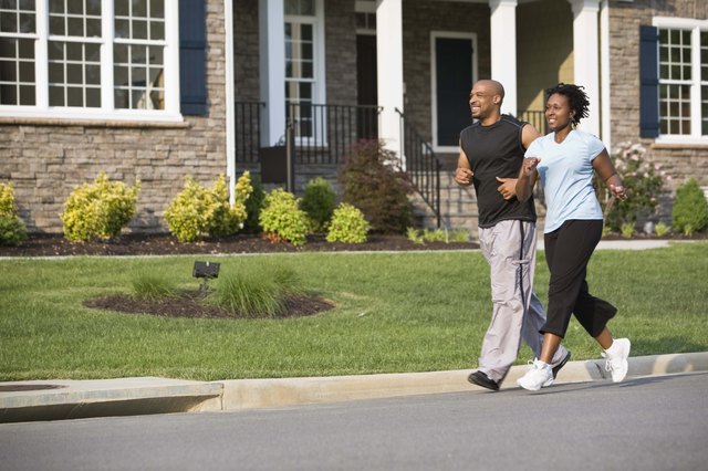 Couple running on street