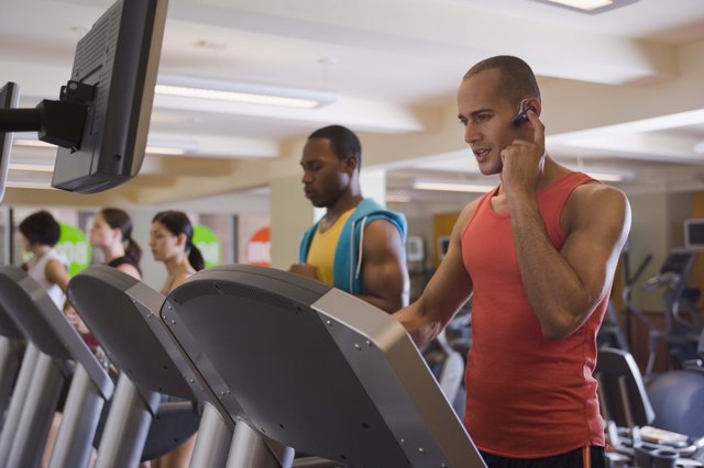 People on treadmills in gym