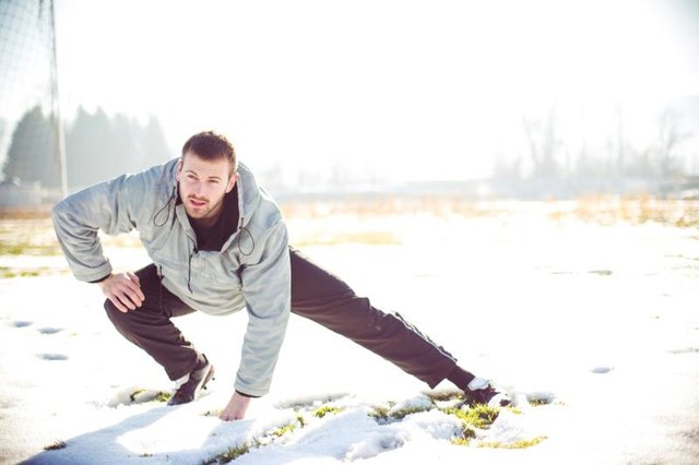 Man doing his training on winter day