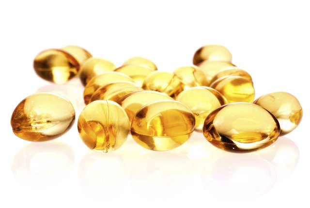 fish oil capsules isolated on white background