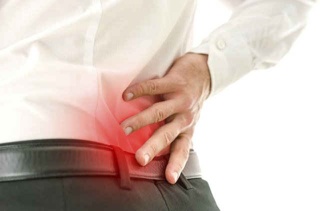 Detail of man suffering from back pain