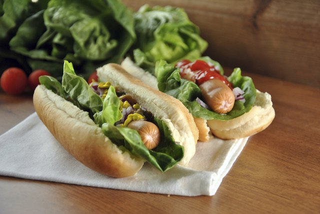 two hot dogs with salad