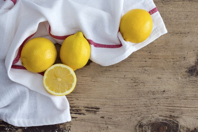 Lemon on rustic wooden background