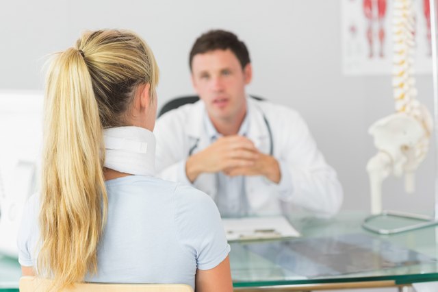 Attractive doctor having an appointment with a patient