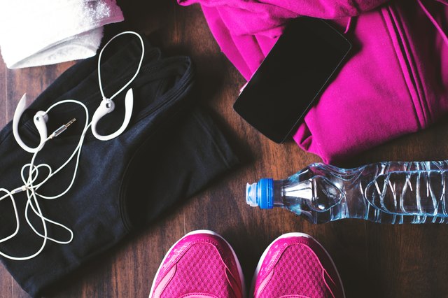 A pile of sports equipment on the floor