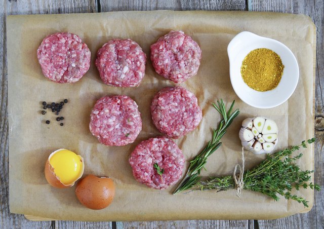 chopped steaks with rosemary, garlic, egg and thyme