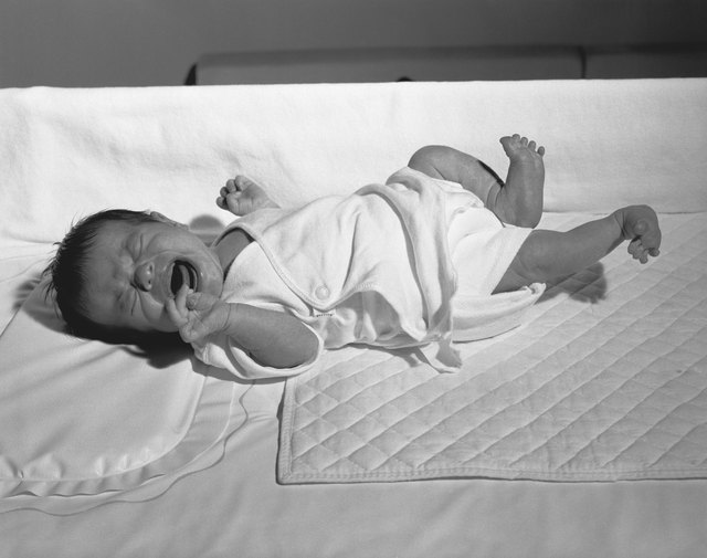 elevating crib mattress for reflux