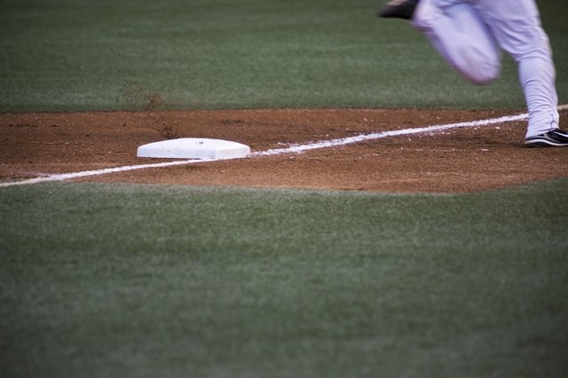 Baseball player running home