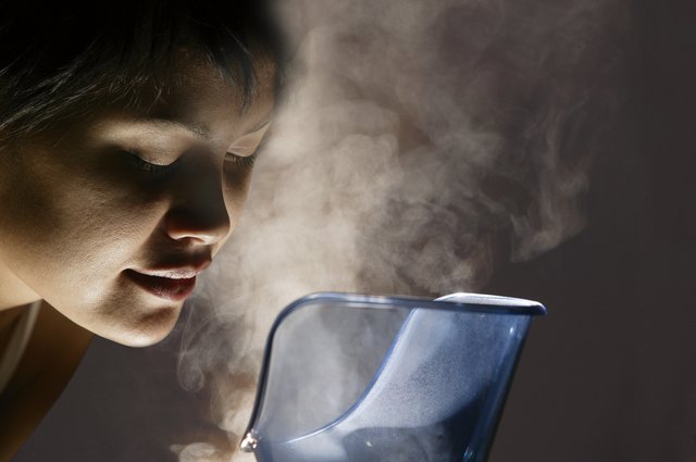 Woman steaming her face