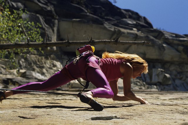 Female rock climber, Washington, USA, low angle view