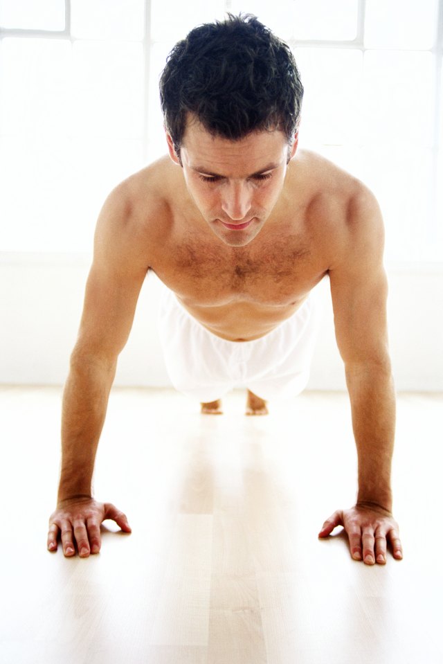 a young man doing pushups