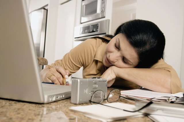 Mature woman resting at a table