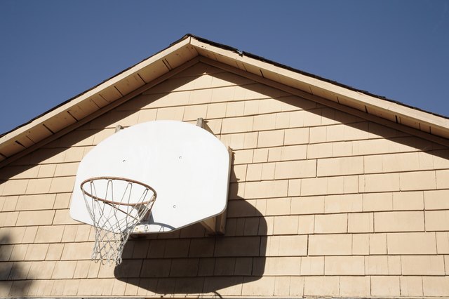 How to Attach a Basketball Backboard to a Wall ...