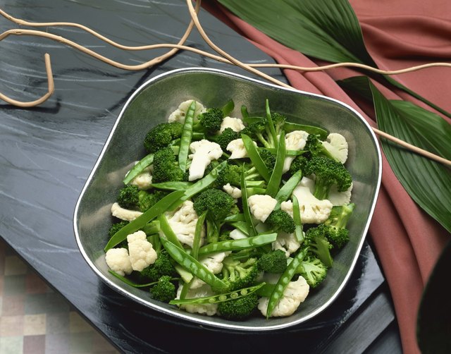 Cauliflower , broccoli , and snow peas
