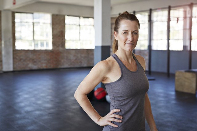 Portrait of female crossfit instructor at gym