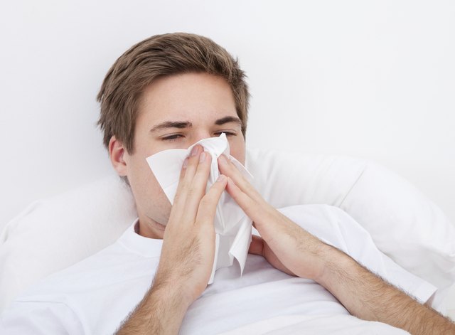 Man Blowing His Nose