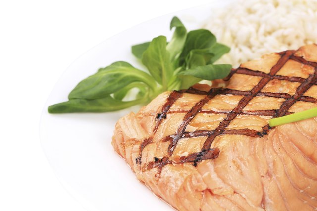 Roasted salmon fillets with rice.