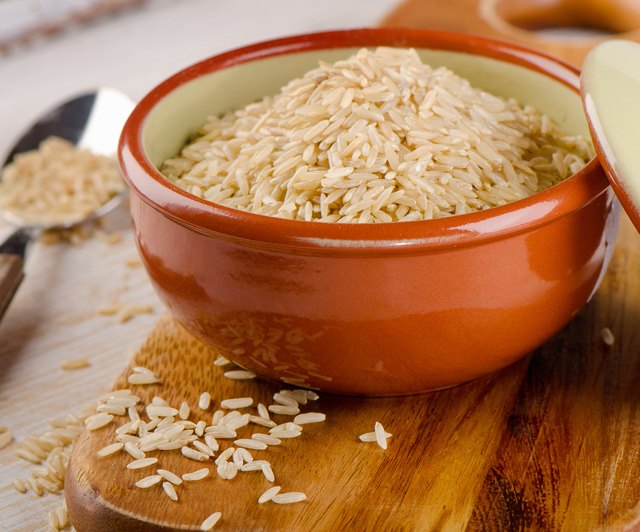 natural brown rice in bowl .
